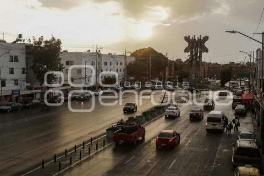 ATARDECER . LLUVIA
