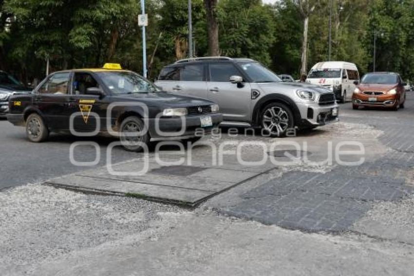 PAVIMENTO DAÑADO