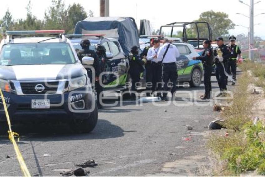 SEGURIDAD . MUJER BALEADA
