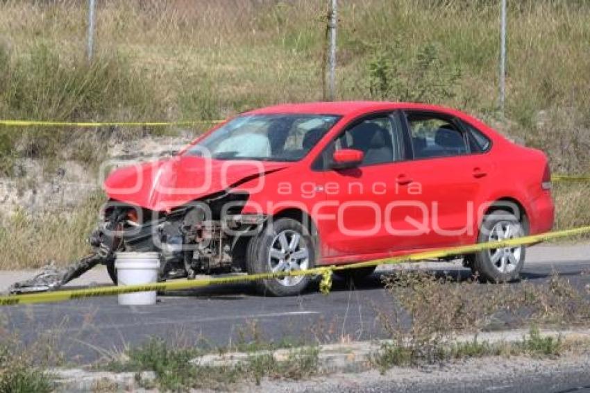 SEGURIDAD . MUJER BALEADA