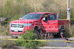 SEGURIDAD . MUJER BALEADA