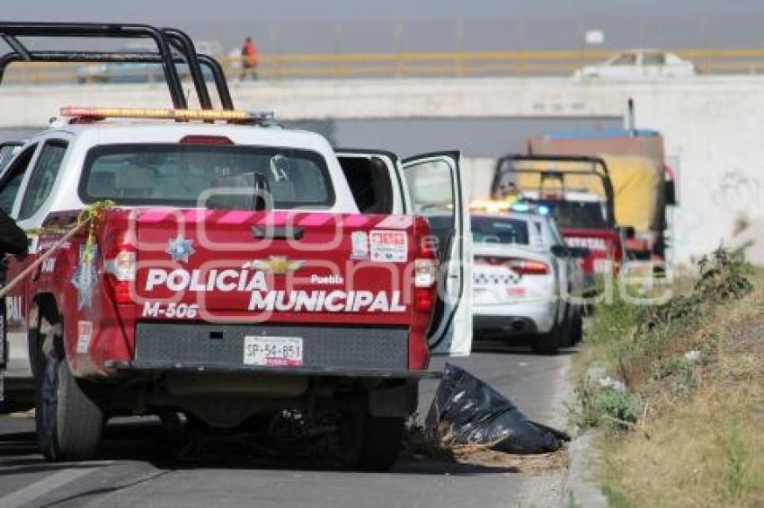 NOTA ROJA . EMBOLSADO AUTOPISTA