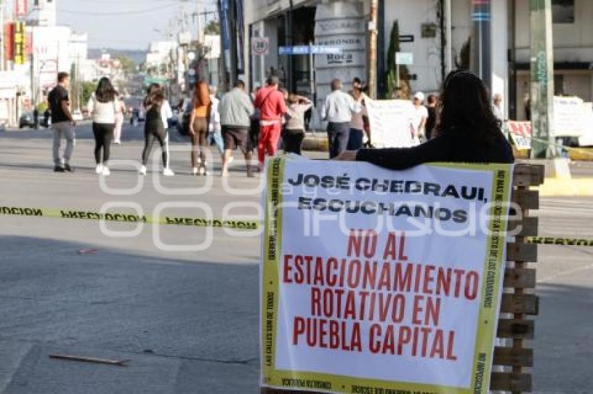 MANIFESTACIÓN . PARQUÍMETROS