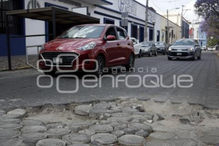 ADOQUÍN EN MAL ESTADO