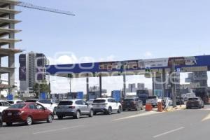 CASETA . VÍA ATLIXCÁYOTL