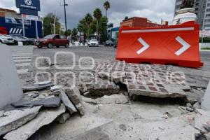 AVENIDA JUÁREZ . PAVIMENTO LEVANTADO