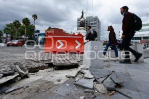 AVENIDA JUÁREZ . PAVIMENTO LEVANTADO