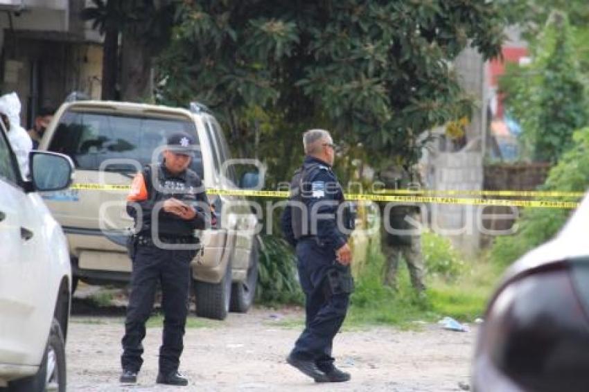 MUJER ASESINADA