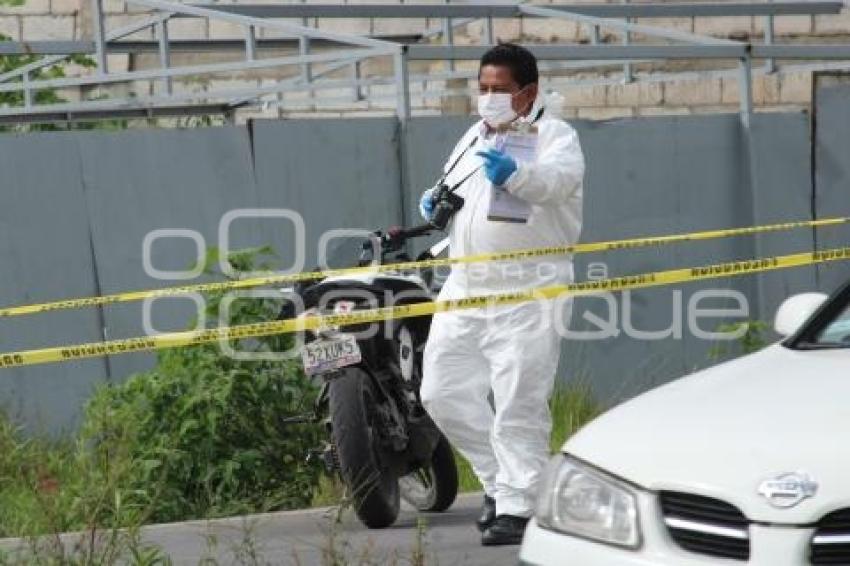 HOMICIDIO . AUTOLAVADO