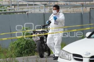 HOMICIDIO . AUTOLAVADO