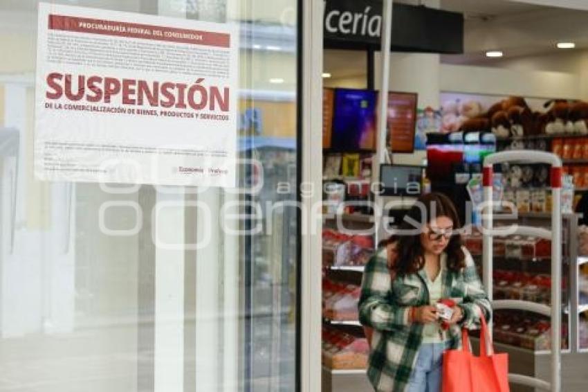 PROFECO . SUSPENSIÓN WOOLWORTH