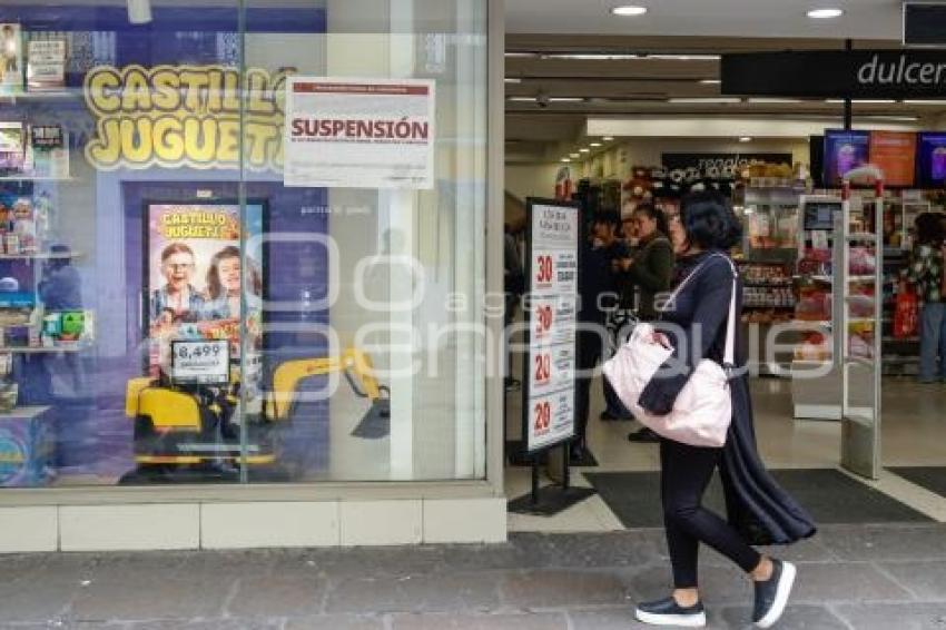PROFECO . SUSPENSIÓN WOOLWORTH