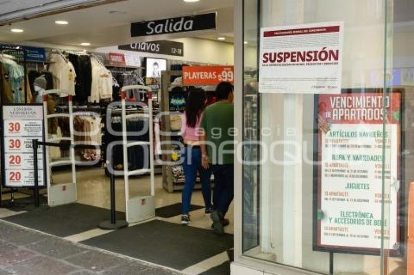 PROFECO . SUSPENSIÓN WOOLWORTH