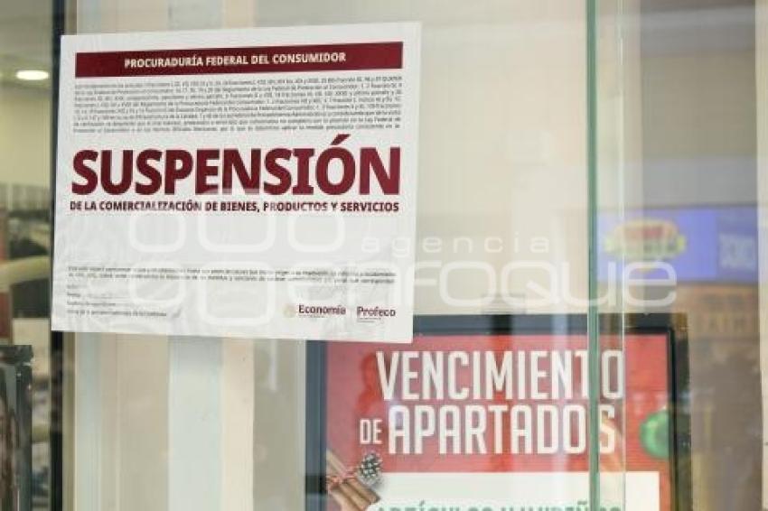 PROFECO . SUSPENSIÓN WOOLWORTH