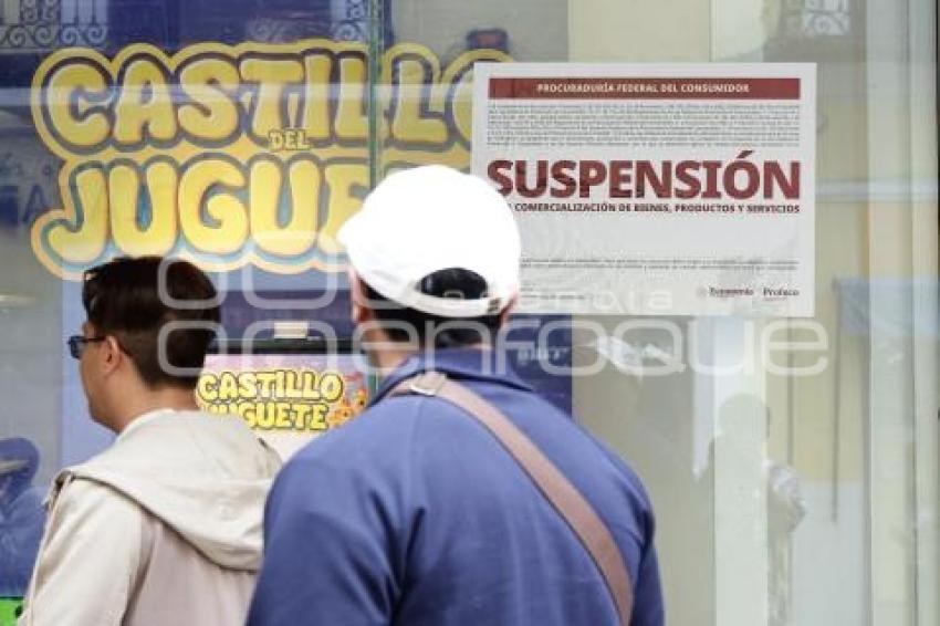 PROFECO . SUSPENSIÓN WOOLWORTH