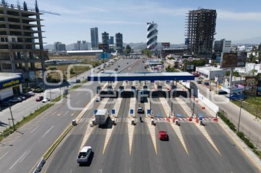 CASETA . VÍA ATLIXCÁYOTL