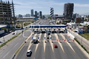 CASETA . VÍA ATLIXCÁYOTL