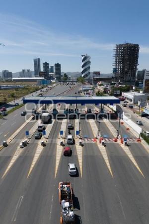 CASETA . VÍA ATLIXCÁYOTL