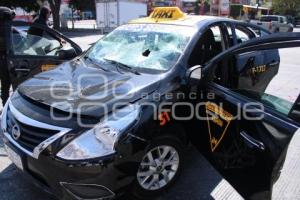 TAXI VANDALIZADO