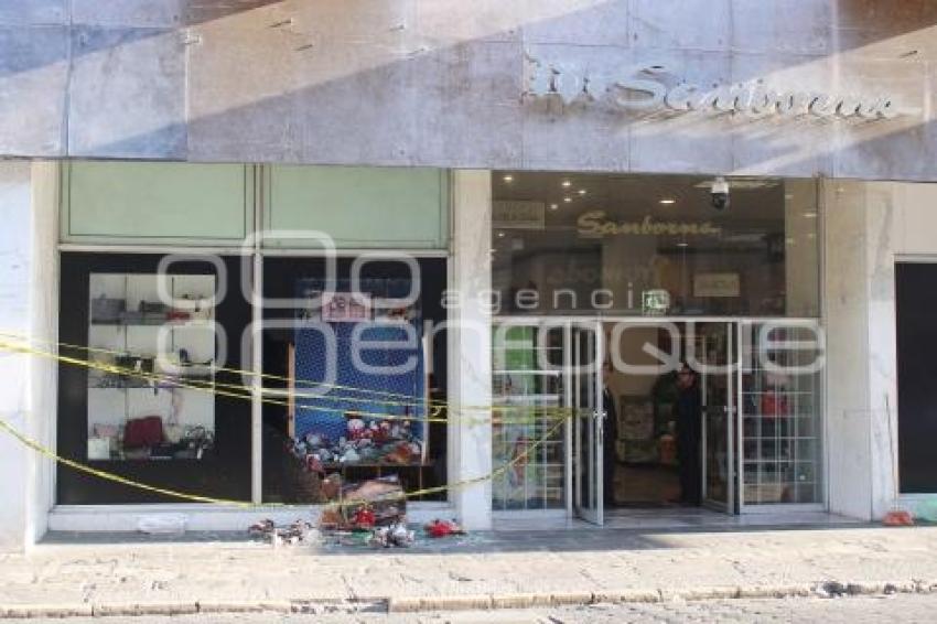 SEGURIDAD . CRISTALAZO SANBORNS