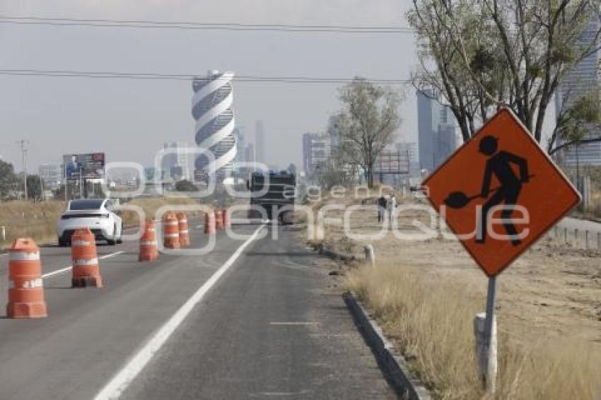 CASETA . VÍA ATLIXCÁYOTL