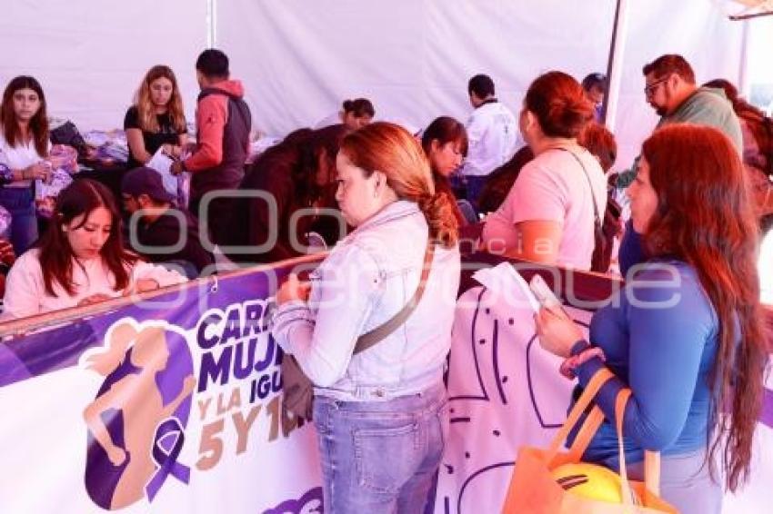 CARRERA POR LAS MUJERES . ENTREGA DE KITS
