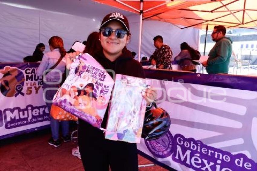 CARRERA POR LAS MUJERES . ENTREGA DE KITS
